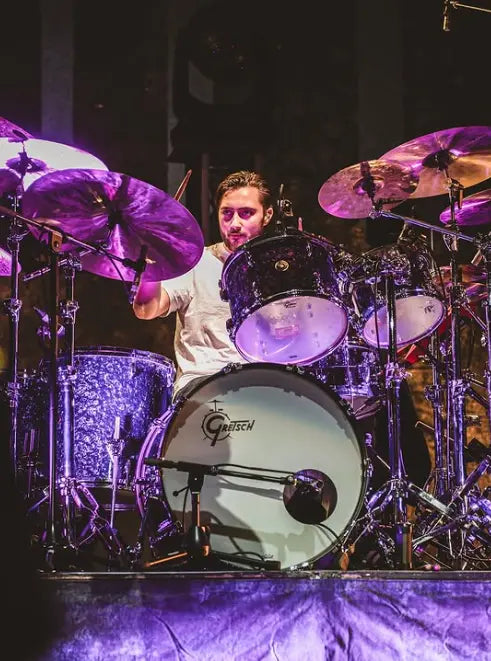 Nic Collins playing his Gretsch USA Custom kit on stage