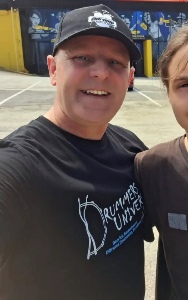 Derrick Badenhorst - the first customer to order a personalised Drummers Universe Above Average tee