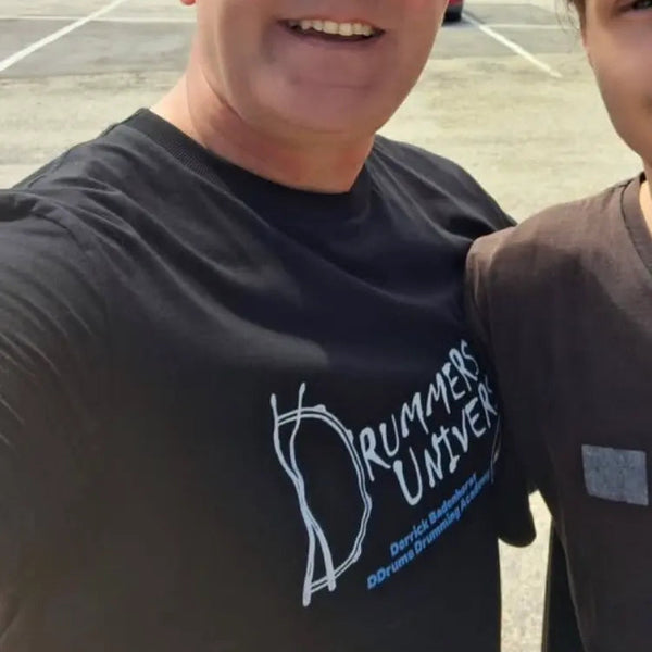 above average customer wearing their personalised Drummers Universe tee