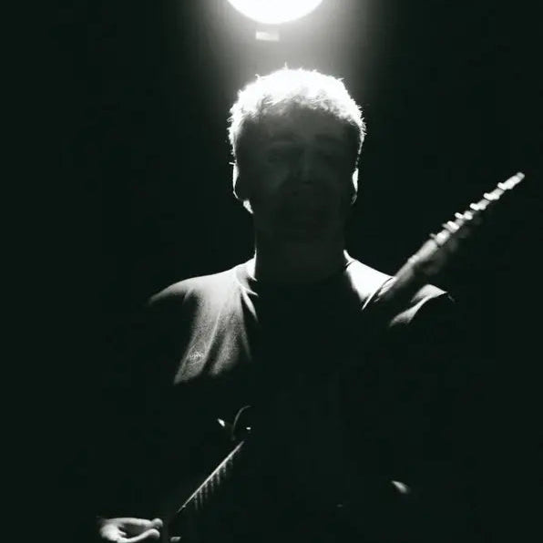 Above Average collaborator Tom Rackliff on stage for Alfie Neale gig