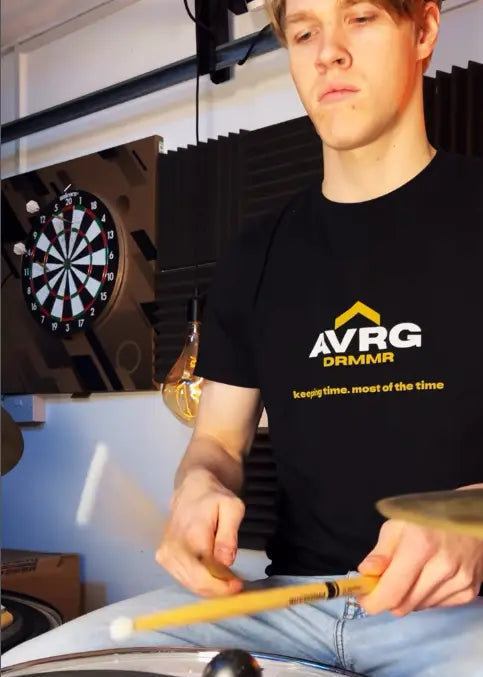 Drummer Charlie Gregory wearing his 'Keeping Time' tee from Above Average Clothing