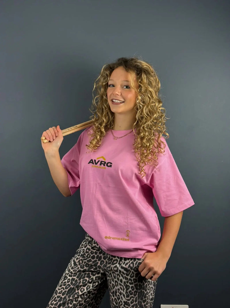 loladrums wearing her pink oversized Above Average Clothing DRMMR tee