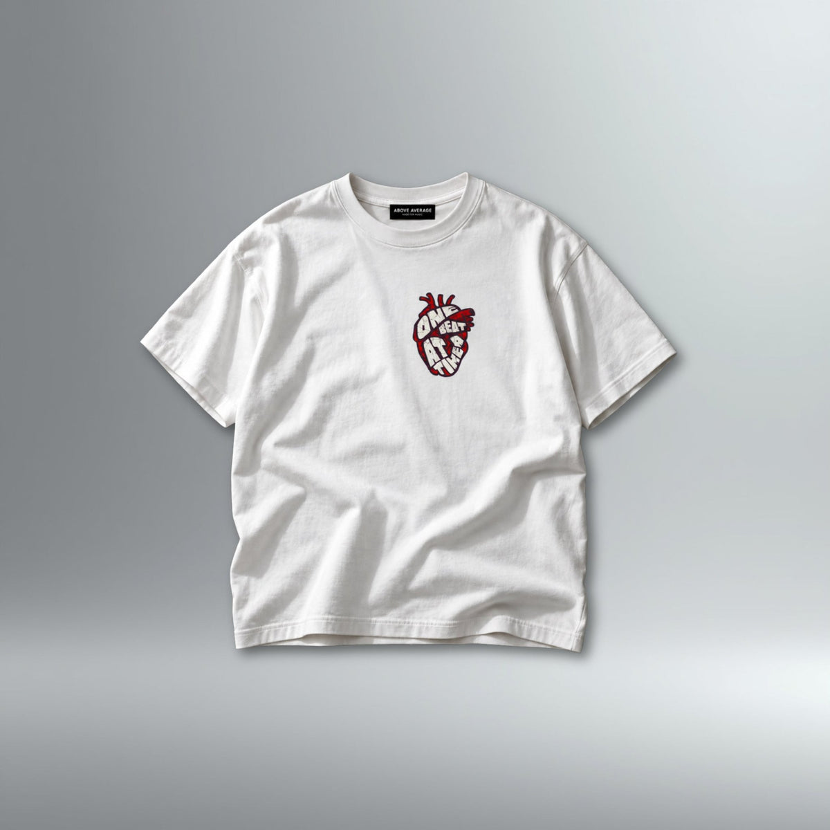 'One Beat At A Time' White Tee | Above Average Clothing | organic cotton apparel