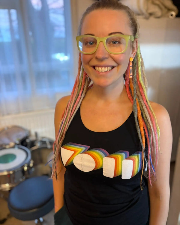 vicky o'neon wearing one of own design vest tops made in collaboration with Above Average Clothing