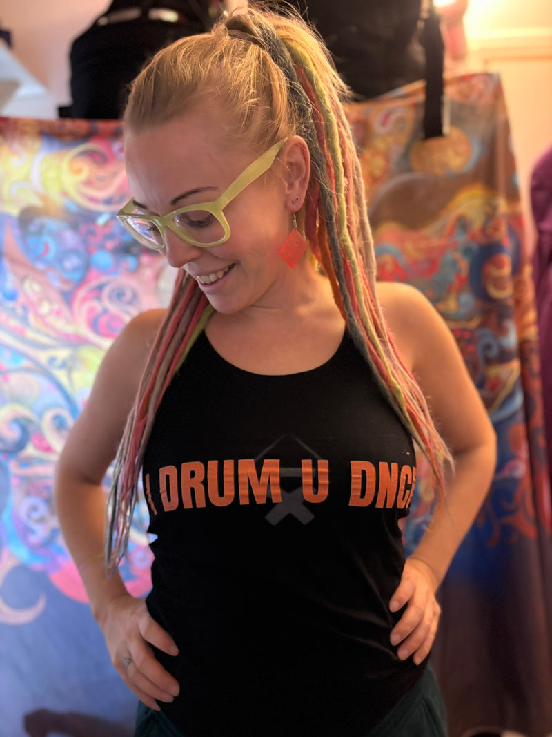 vicky o neon wearing an I DRUM U DANCE vest top from her own collection with Above Average Clothing